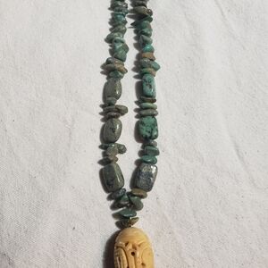 Green Stone Necklace with Carved Pendant